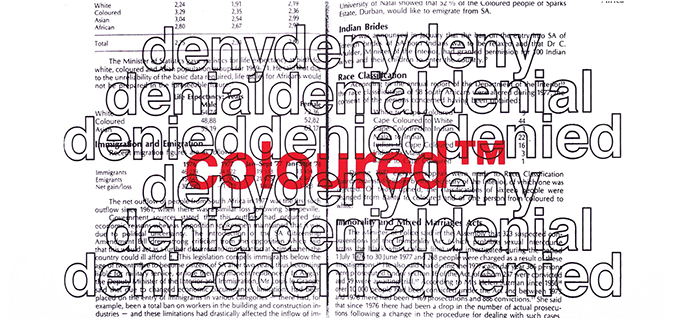 Detail of a screen print work with layers of text from a book outlines of words deny denial denied and in red centered, the word colouredtm.